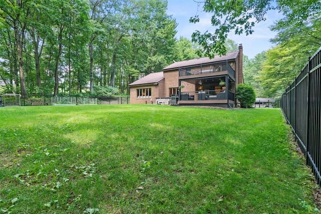 268 Glade Mills Rd, Middlesex Twp, PA 16059 - rear view of house featuring a fenced backyard, a chimney, a wooden deck, and brick siding