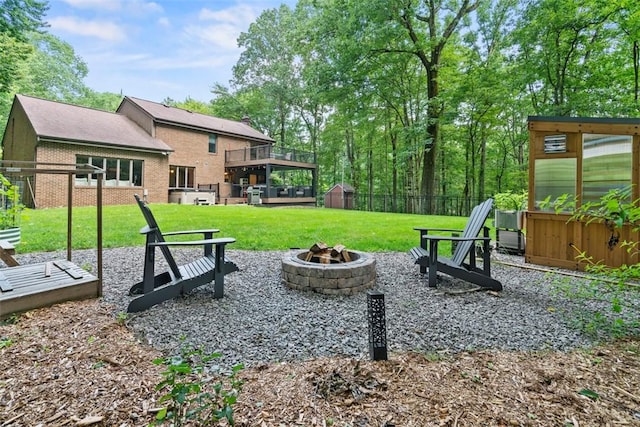 268 Glade Mills Rd, Middlesex Twp, PA 16059 - view of yard with an outdoor fire pit, a storage shed, and a wooden deck