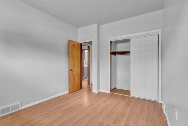 880 Patton St, Monroeville, PA 15146 - unfurnished bedroom with light wood-style floors and a closet