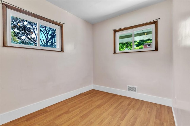 880 Patton St, Monroeville, PA 15146 - empty room featuring healthy amount of natural light and light wood finished floors