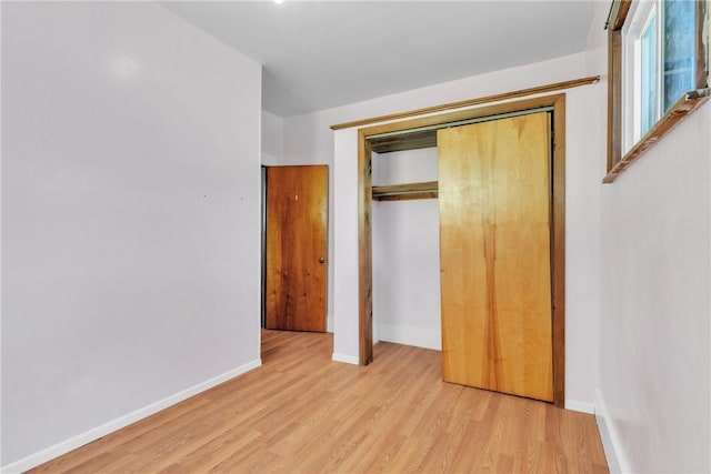 880 Patton St, Monroeville, PA 15146 - unfurnished bedroom featuring light wood-style floors and a closet