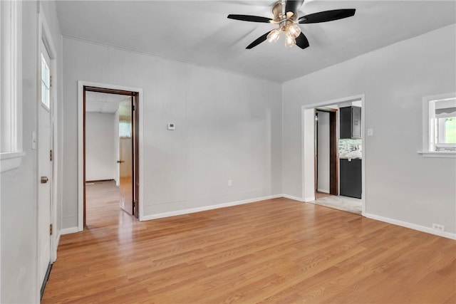 880 Patton St, Monroeville, PA 15146 - spare room with light wood finished floors and a ceiling fan