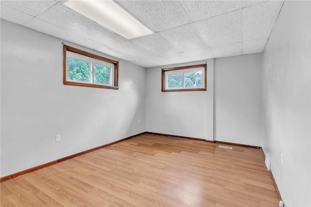 880 Patton St, Monroeville, PA 15146 - spare room with light wood-style floors and a paneled ceiling