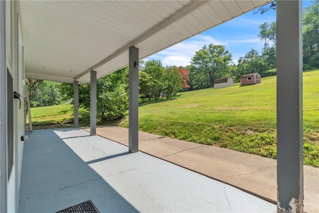 880 Patton St, Monroeville, PA 15146 - view of patio / terrace featuring a storage shed and view of scattered trees