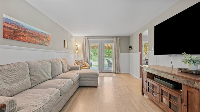 77 Ridgecrest Dr, Wilkins Twp, PA 15235 - living area featuring wainscoting and light wood-style floors