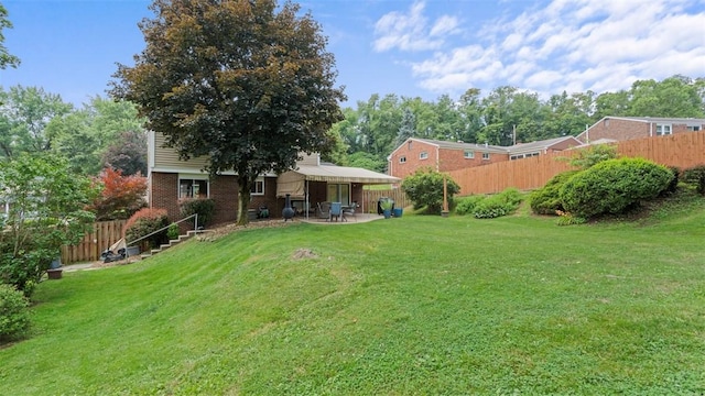 77 Ridgecrest Dr, Wilkins Twp, PA 15235 - fenced backyard with a patio area