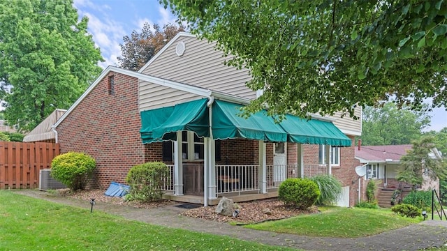 77 Ridgecrest Dr, Wilkins Twp, PA 15235 - view of front facade featuring brick siding and a porch