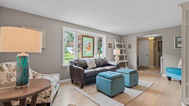 77 Ridgecrest Dr, Wilkins Twp, PA 15235 - living area featuring light wood-type flooring and baseboards