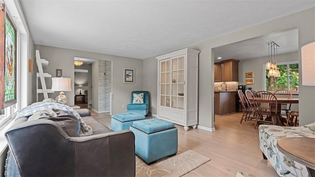 77 Ridgecrest Dr, Wilkins Twp, PA 15235 - living area with light wood-style floors and baseboards