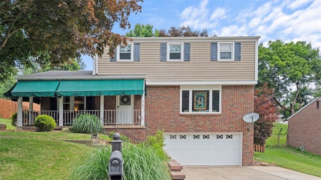 77 Ridgecrest Dr, Wilkins Twp, PA 15235 - view of front facade with a garage, brick siding, a front lawn, and concrete driveway