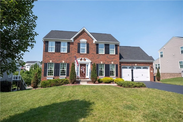 107 Marias Way S, Park, PA 15129 - colonial inspired home with brick siding, driveway, and a front lawn