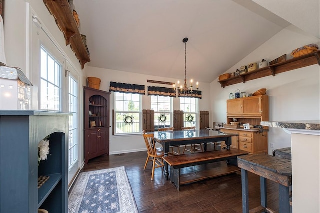 107 Marias Way S, Park, PA 15129 - dining room with a chandelier, dark wood-type flooring, vaulted ceiling, and a fireplace