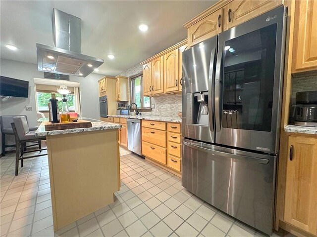 132 Terrace Dr, North Sewickley Twp, PA 16117 - kitchen featuring appliances with stainless steel finishes, extractor fan, a center island, backsplash, and recessed lighting