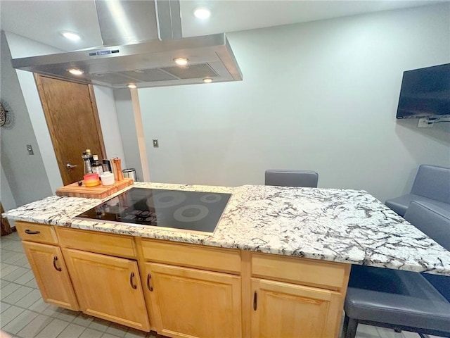 132 Terrace Dr, North Sewickley Twp, PA 16117 - kitchen with black electric cooktop, exhaust hood, light tile patterned floors, light stone countertops, and light brown cabinets