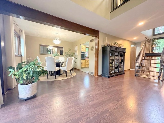 132 Terrace Dr, North Sewickley Twp, PA 16117 - living room with wood finished floors, stairs, a chandelier, and recessed lighting