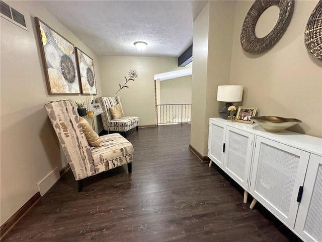 132 Terrace Dr, North Sewickley Twp, PA 16117 - living area with wood finished floors and a textured ceiling