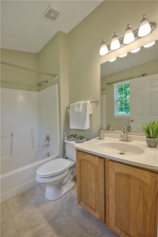 651 Village Green Blvd E, Adams Twp, PA 16046 - full bathroom with vanity, washtub / shower combination, and tile patterned floors