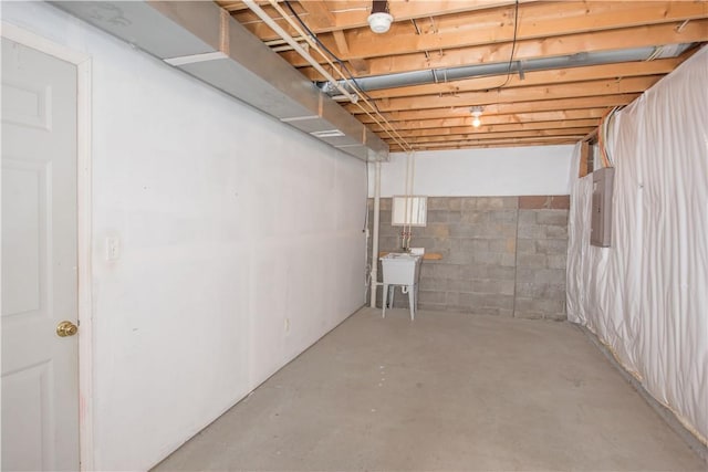 651 Village Green Blvd E, Adams Twp, PA 16046 - unfinished basement featuring electric panel and concrete block wall