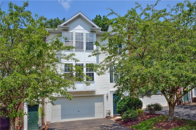 651 Village Green Blvd E, Adams Twp, PA 16046 - view of front facade featuring asphalt driveway and an attached garage