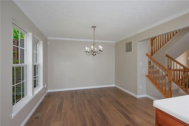 651 Village Green Blvd E, Adams Twp, PA 16046 - spare room featuring wood finished floors, a chandelier, stairway, and crown molding