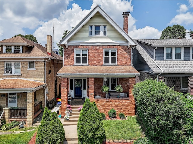 3238 Gaylord Ave, Dormont, PA 15216 - view of front of house with a porch, brick siding, and a chimney