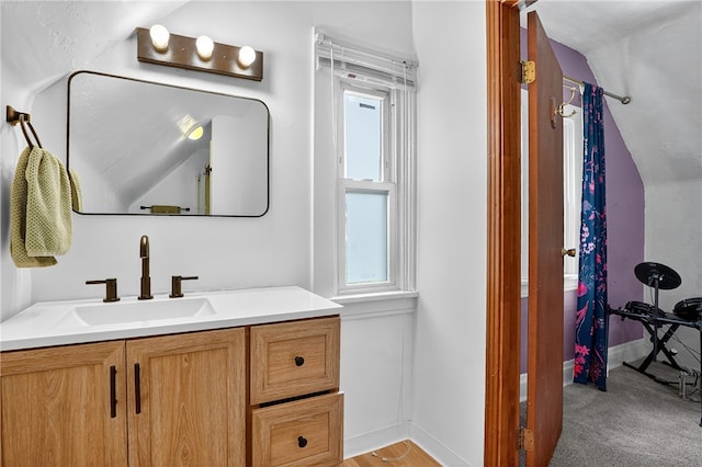 3238 Gaylord Ave, Dormont, PA 15216 - bathroom with plenty of natural light, vanity, and vaulted ceiling