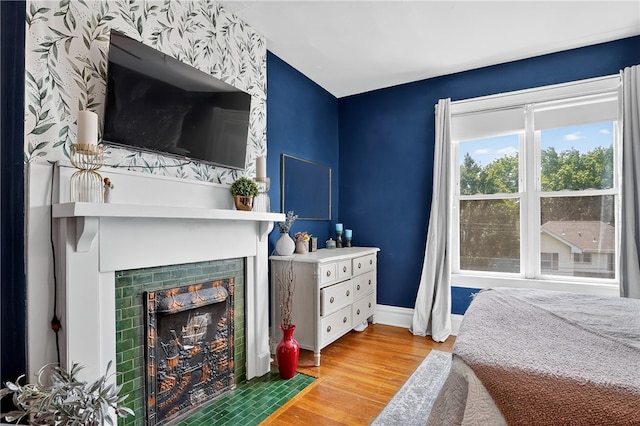 3238 Gaylord Ave, Dormont, PA 15216 - bedroom featuring wood finished floors and a large fireplace