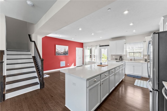 519 Captain Lee Boss Way, Cranberry Twp, PA 16066 - kitchen featuring freestanding refrigerator, a center island, recessed lighting, dark wood finished floors, and white cabinets