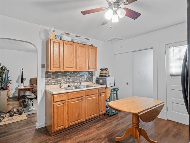 318 Penn Ave, Aliquippa, PA 15001 - kitchen with backsplash, light countertops, dark wood finished floors, and a ceiling fan