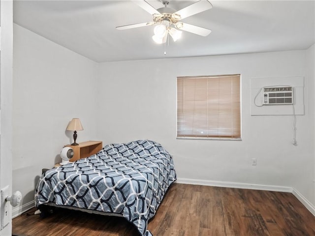 318 Penn Ave, Aliquippa, PA 15001 - bedroom featuring a wall unit AC, wood finished floors, and a ceiling fan