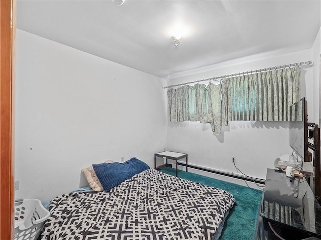 318 Penn Ave, Aliquippa, PA 15001 - carpeted bedroom with a baseboard radiator