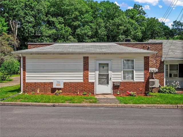 318 Penn Ave, Aliquippa, PA 15001 - view of front of house featuring brick siding and a shingled roof