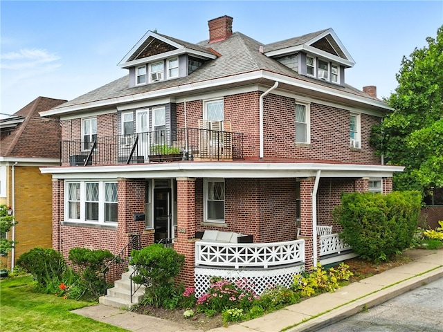 3100 Wainbell Ave, Dormont, PA 15216 - view of front facade with a balcony, brick siding, and a chimney