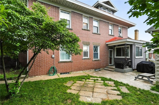 3100 Wainbell Ave, Dormont, PA 15216 - back of house featuring brick siding and a patio area