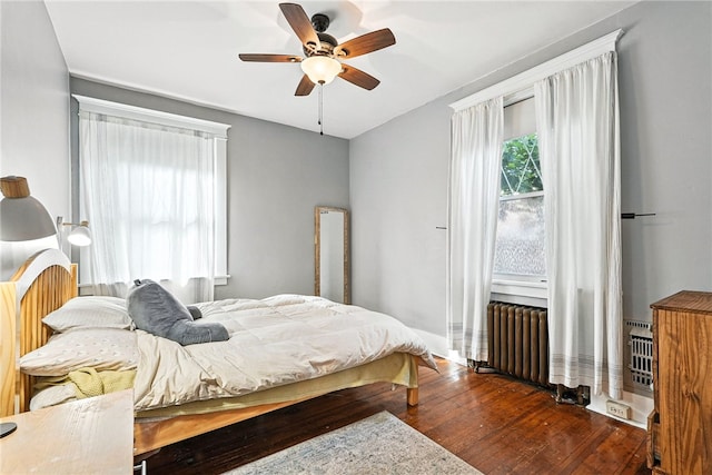 3100 Wainbell Ave, Dormont, PA 15216 - bedroom with radiator heating unit, wood finished floors, and a ceiling fan