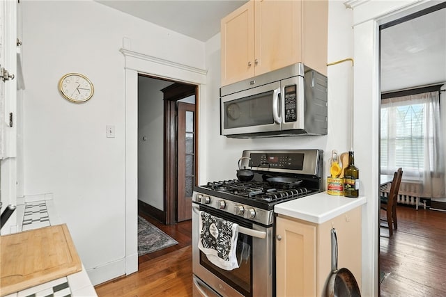 3100 Wainbell Ave, Dormont, PA 15216 - kitchen with stainless steel appliances, hardwood / wood-style flooring, and light countertops