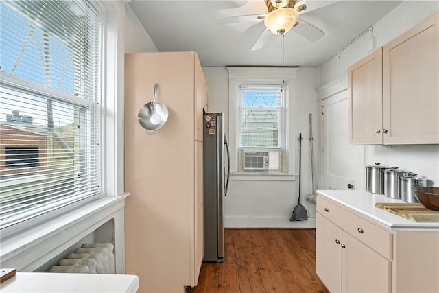 3100 Wainbell Ave, Dormont, PA 15216 - kitchen with freestanding refrigerator, dark wood-type flooring, ceiling fan, light countertops, and cooling unit