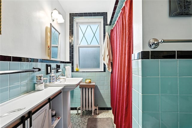 3100 Wainbell Ave, Dormont, PA 15216 - bathroom featuring tile walls, radiator heating unit, wainscoting, and a shower with shower curtain