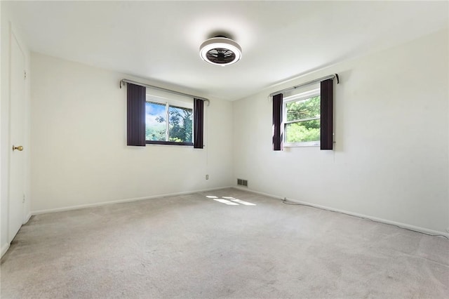 3931 Boulevard Dr, Squirrel Hill, PA 15217 - unfurnished room with healthy amount of natural light and light colored carpet