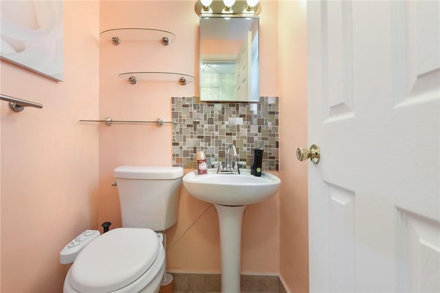 3931 Boulevard Dr, Squirrel Hill, PA 15217 - half bathroom with decorative backsplash and toilet