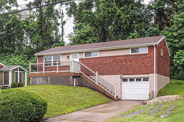 125 Holstein Dr, North Fayette, PA 15071 - single story home featuring brick siding, a garage, a front lawn, and concrete driveway