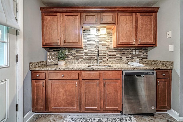 125 Holstein Dr, North Fayette, PA 15071 - kitchen featuring dishwasher, backsplash, brown cabinetry, and light stone countertops