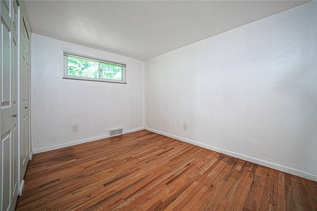 125 Holstein Dr, North Fayette, PA 15071 - empty room with wood finished floors and baseboards