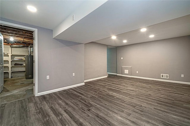 125 Holstein Dr, North Fayette, PA 15071 - finished below grade area with dark wood-type flooring, gas water heater, and recessed lighting