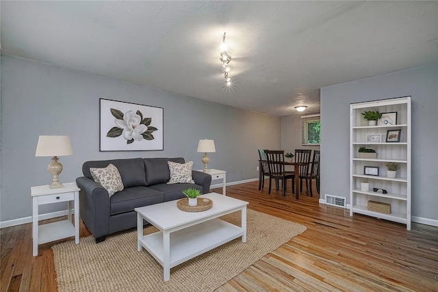 125 Holstein Dr, North Fayette, PA 15071 - living room with light wood finished floors and baseboards