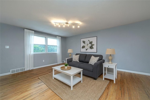 125 Holstein Dr, North Fayette, PA 15071 - living area featuring wood finished floors and baseboards