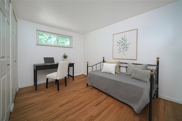 125 Holstein Dr, North Fayette, PA 15071 - bedroom with light wood-style floors and an office area