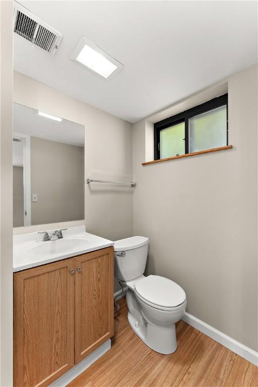 900 Tottenham Dr, Coraopolis, PA 15108 - bathroom with wood finished floors and vanity