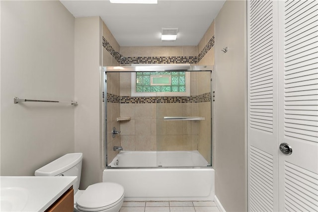 900 Tottenham Dr, Coraopolis, PA 15108 - bathroom with vanity, bath / shower combo with glass door, a closet, and tile patterned flooring