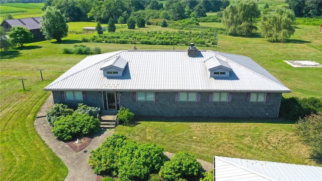 405 Hogg Rd, Worthington, PA 16262 - view of front facade featuring brick siding, a front lawn, and a metal roof